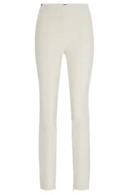 Pantalones extra slim fit en tejido elástico técnico